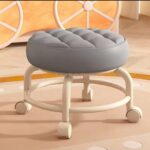 Rotating rolling stool with leather cushion seat